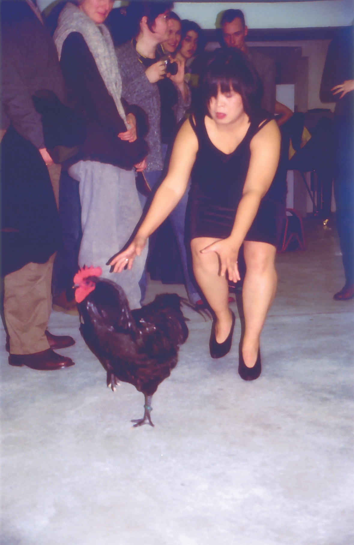 Melati Suryodarmo, “Why Let the Chicken Run?”, performed at A little bit of History Repeated, group exhibition at Kunst Werke, Berlin ,2002