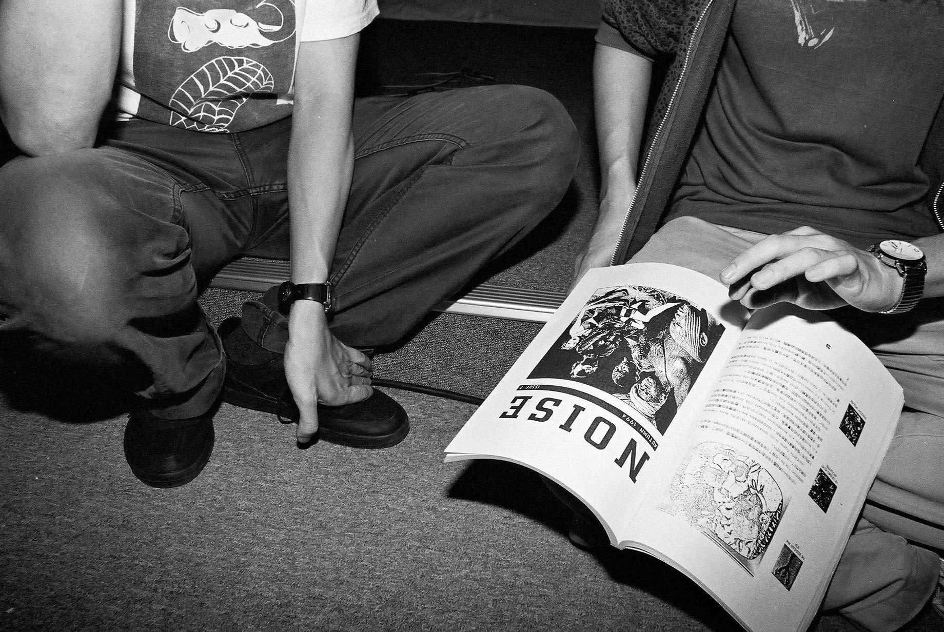 People reading Noise at exhibition Lurking Waves: Fujui Wang / Collected Objects from the ’90s, The Cube, Taipei, photo by Etang Chen