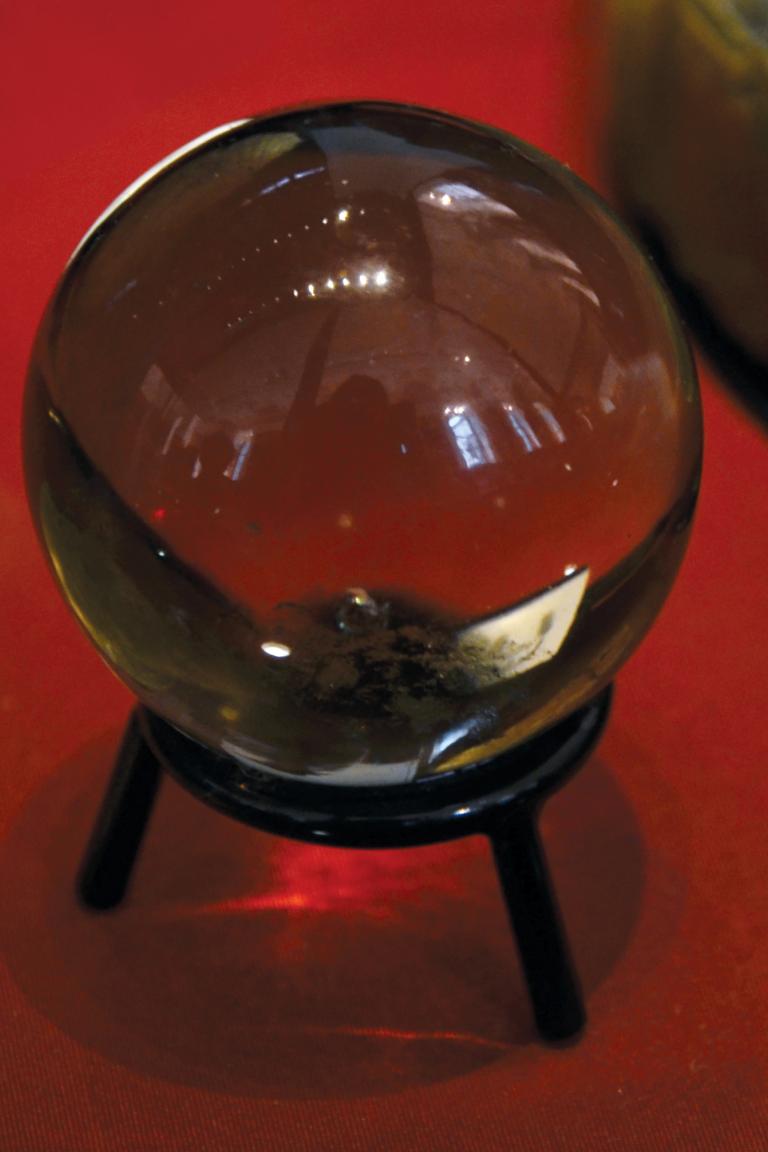 Left: John Dee’s obsidian crystal ball, used for scrying, 16th century. British Museum, London. Right: Crystal used by John Dee for clairvoyance and curing disease, said to have been given to him by the angel Uriel in 1582. Science Museum Group Collection