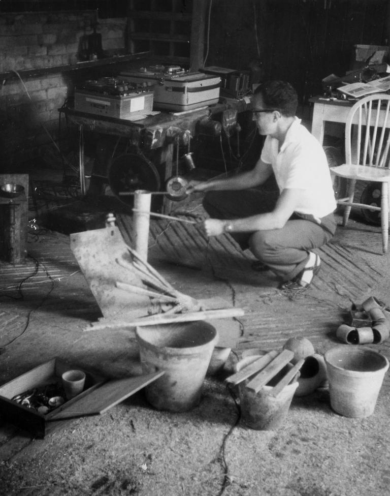 Douglas Lilburn recording sounds in a barn, Wiltshire, England - Photograph taken by Peter Russell Crowe