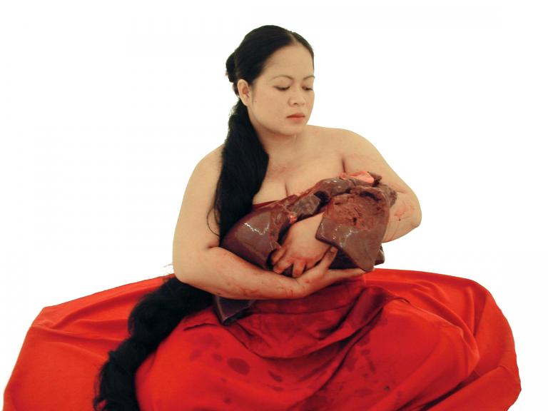 Melati Suryodarmo, “The Promise”(2002), performed at the Gallery Futura, Prague, 2004. Photo by Eugenio Percossi. Photo courtesy of the artist.