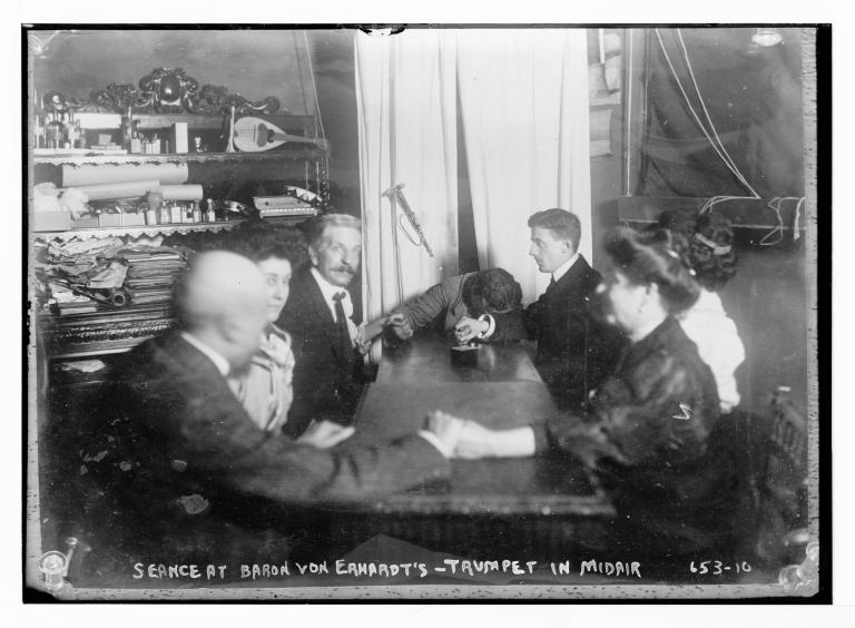 Séances held at the studio of Baron von Erhardt in Rome, Italy, 1909. The New York Times.